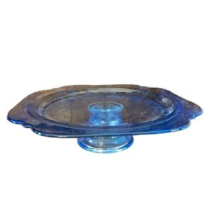 Federal Depression glass blue 2-inch footed cake plate.